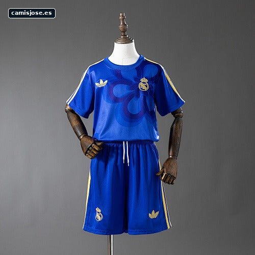 Real Madrid 25/26 Cultural Story — azul infantil talla 16-28