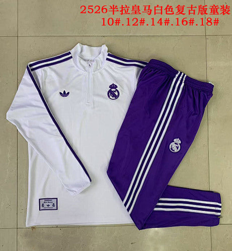 25-26 Infantil Conjunto de entrenamiento con media cremallera Real Madrid
